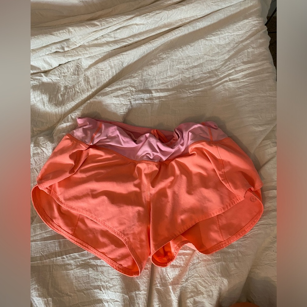 Pink lululemon speed up shorts